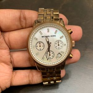Michael Kors rose gold and mother of pearl face watch